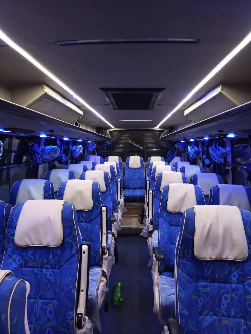 Rent 27+1 seater mini bus.