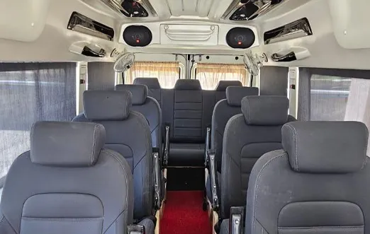 9 Seater Maharaja Tempo Traveller.
